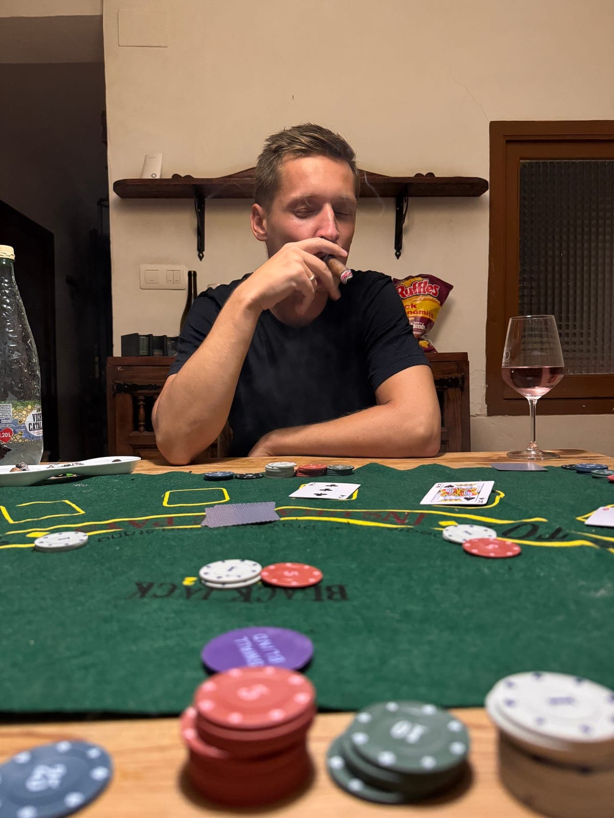 A poker table with cards and chips